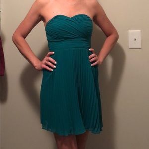 Green pleated dress